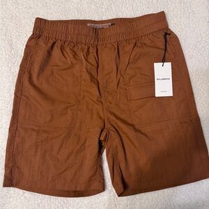 Students Ollie technical stretch nylon shorts burnt brown orange